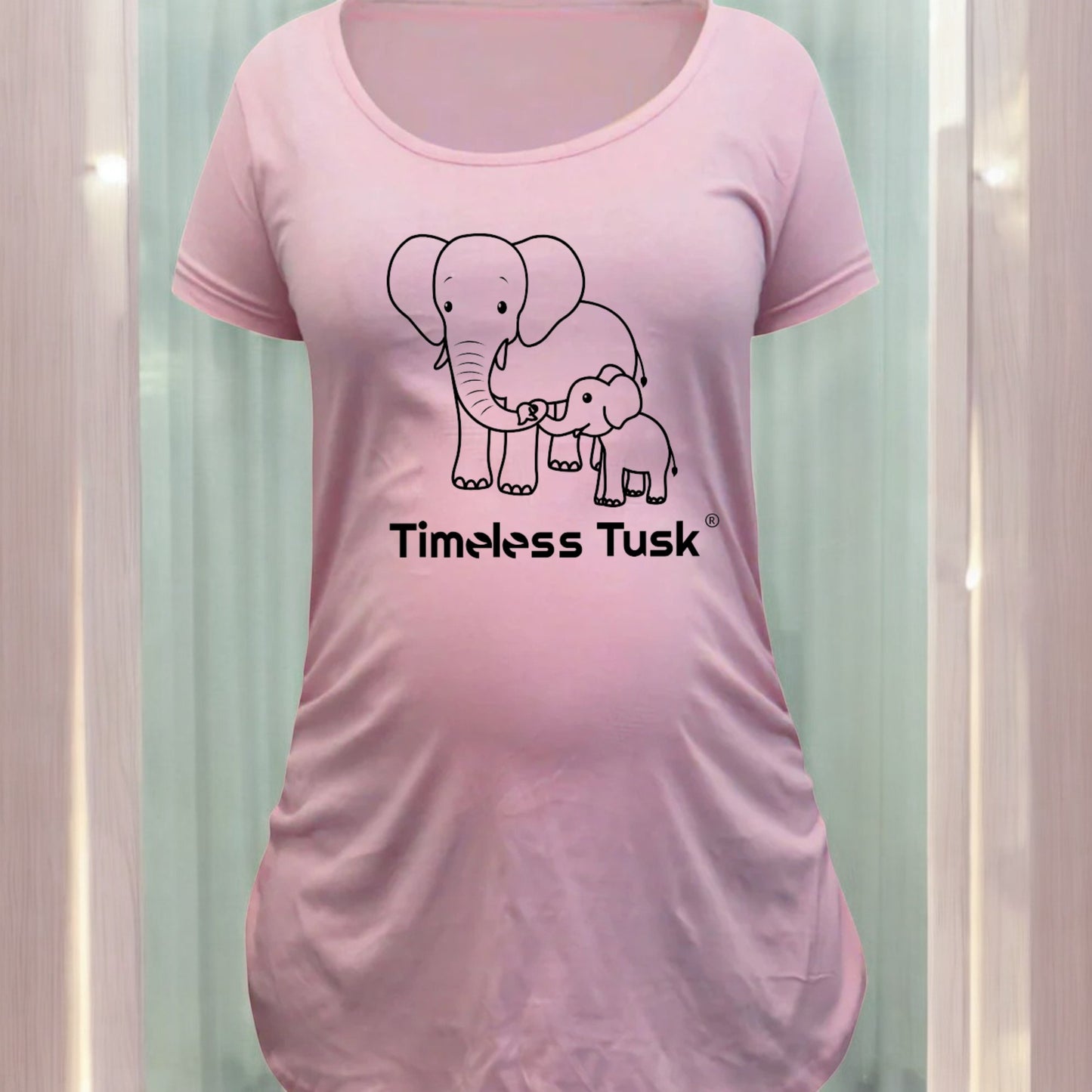 pink maternity t shirt with black line drawing of mom and baby elephant
